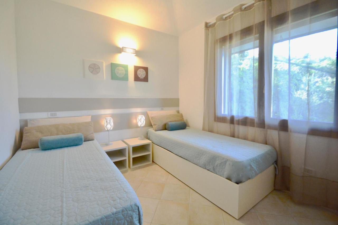 Case Sul Mare Residenze Di Bes Chia Exterior photo