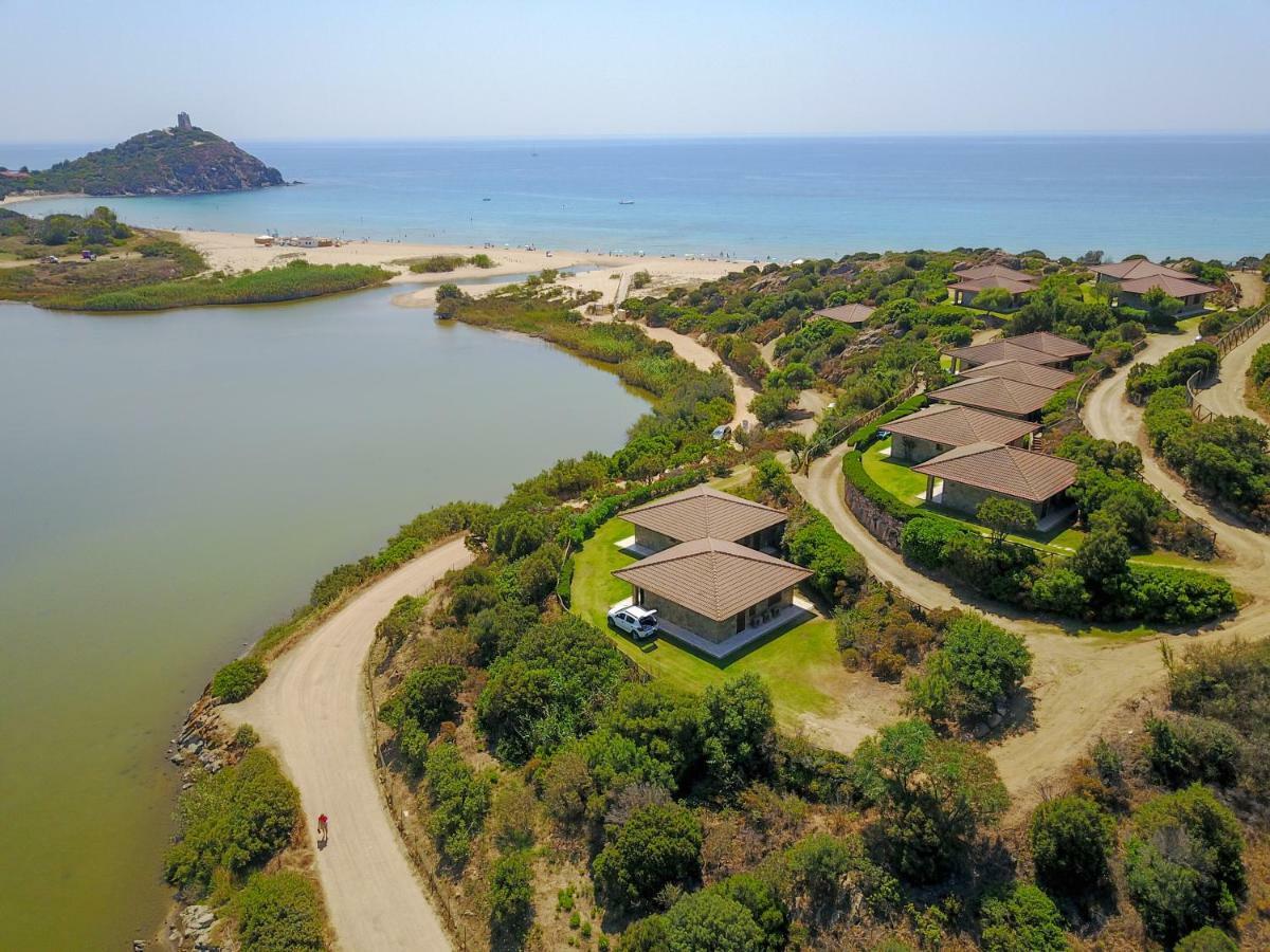Case Sul Mare Residenze Di Bes Chia Exterior photo